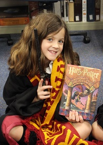 Girl with Harry Potter book